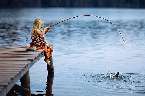 Girl Fishing on a Moat